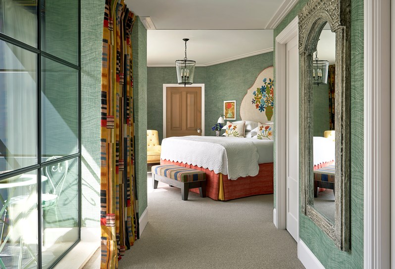 An image from the corridor leading to the primary bedroom of Deluxe Two Bedroom Residence,  Residence 16 at Ham Yard Hotel.