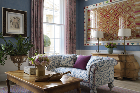 A diagonal shot of the Drawing Room in The Townhouse at Haymarket Hotel