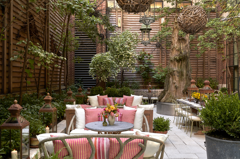 Wide shot of the lounge area of the Sculpture Garden at Crosby Street Hotel