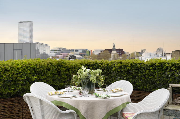 Dining table on the terrace shot of Residence 24, the Penthouse Residence at Ham Yard Hotel