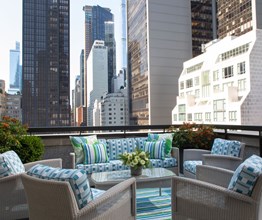 An outdoor terrace overlooking Midtown Manhattan at The Whitby Hotel