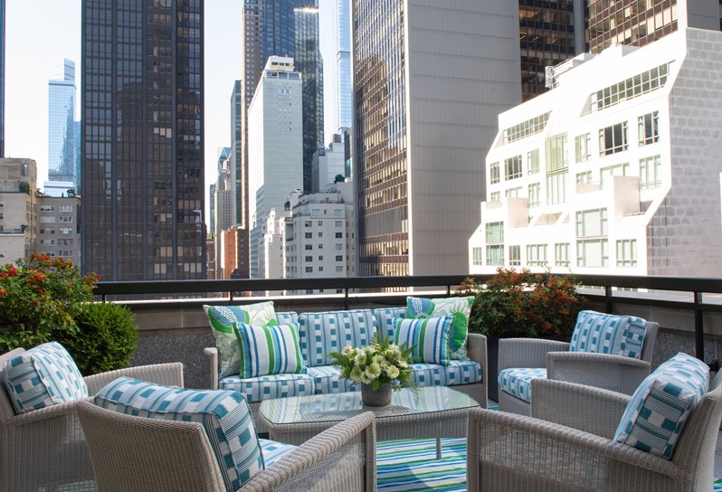 An outdoor terrace overlooking Midtown Manhattan at The Whitby Hotel