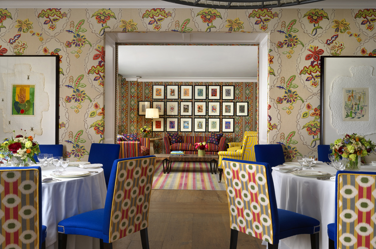 Round dining tables set-up in the Fortune private events room and lounge set up in Lyric room at Covent Garden Hotel