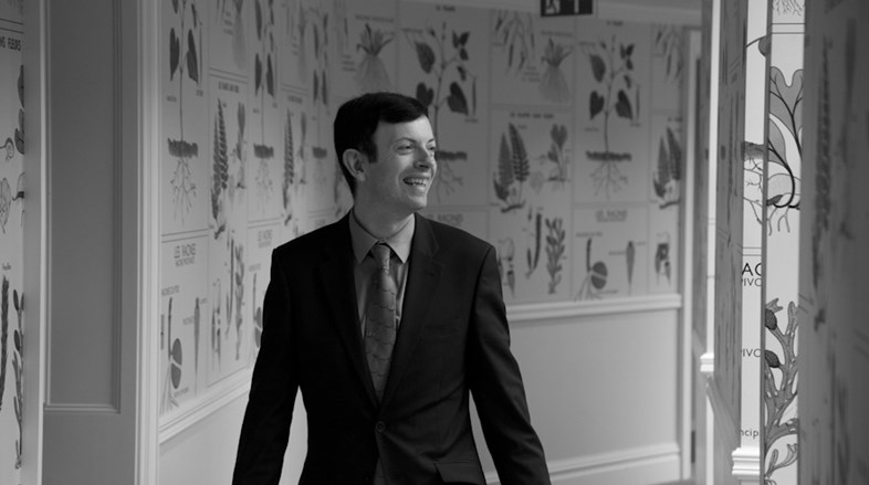 Black and white image of a member of staff