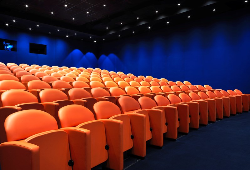 The state-of-the-art screening room with 130 comfortable leather seats in bright coral, advanced Dolby Atmos technology in sound and projection and the latest digital capabilities including 3D.