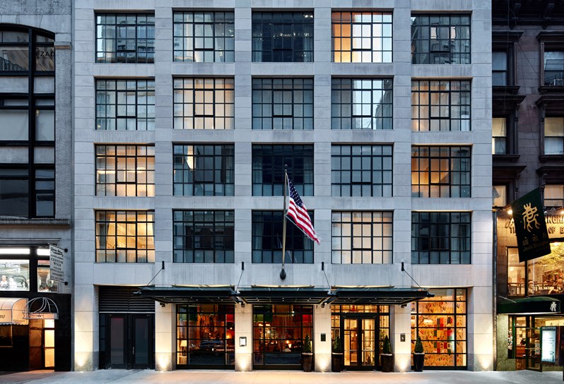 The Whitby Hotel exterior, 16 stories with floor to ceiling windows and direct access to the lobby, restaurant and public areas on the ground floor.