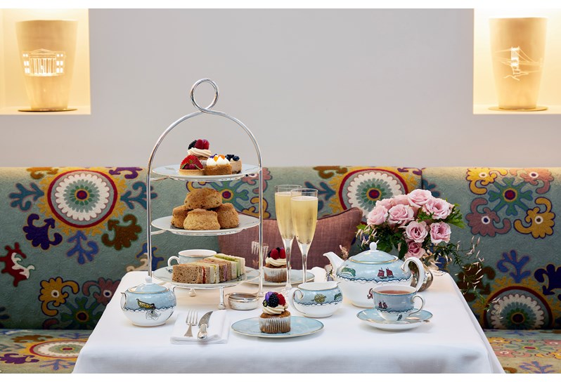 Champagne Afternoon Tea for two, served in The Whitby Restaurant, with sweet and savory treats such as finger sandwiches, scones and cakes, as well as tea served in Kit Kemp's bone china range Mythical Creatures from Wedgwood.