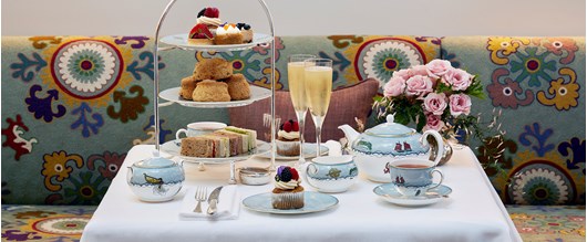 Champagne Afternoon Tea for two, served in The Whitby Restaurant, with sweet and savory treats such as finger sandwiches, scones and cakes, as well as tea served in Kit Kemp's bone china range Mythical Creatures from Wedgwood.