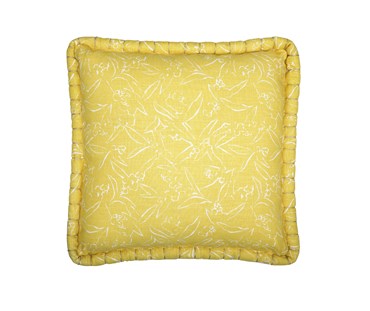 Kit Kemp for Christopher Farr. A square linen cushion in Kit Kemp's Inside Out design in the colour lemon. The cushion's base is lemon and has leafy motifs in white.
