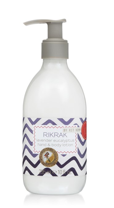 A 295ml plastic bottle of hand and body lotion with pump dispenser scented with Lavender Eucalyptus. Label has a blue rick rack design applied.