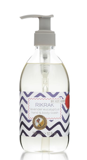 A 295ml plastic bottle of hand and body wash with pump dispenser scented with Lavender Eucalyptus. Label has a blue rick rack design applied.