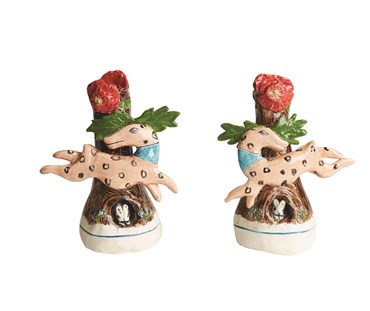 Front view of pair of Antelope candle holder