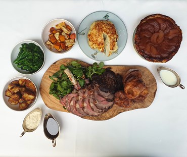 Whole menu. Rib of beef with roast potatoes vegetable shown next to Tarte Tartin.