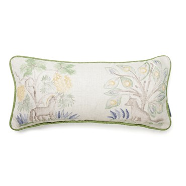 Face on shot of this cushion made with Kit's Hedgerow Quince fabric, a patchwork style motif showing the playful faces of mythical creatures prancing between abundant fruit trees with contrast green piping.
