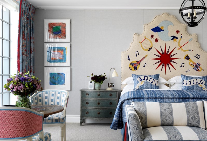 A light and spacious suite with floor to ceiling Crittall windows. There is a king size bed with a statement embroidered headboard