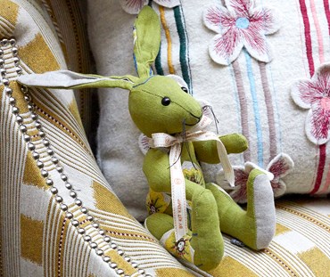 Limited edition friendly flower bunny. Shown in green.
