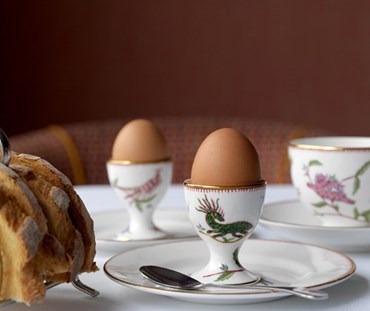 2 egg cups with eggs