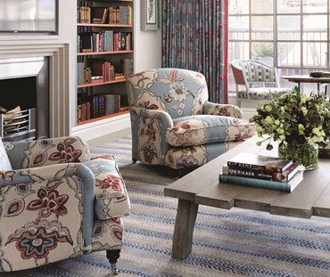 Picture of Soho Hotel - 2 blue sofa's, plank table and Winter Rug