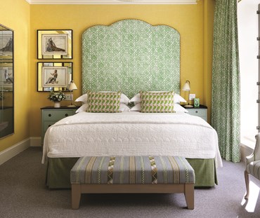 Picture showing a suite - bed with headboard and the end of bed stool at the foot of the bed - End of bed stool in aqua ribbon weave