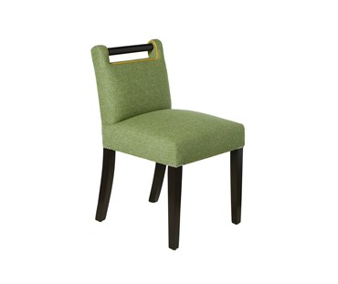 Side view of Handle Chair made in a green parquet wool fabric with an applique pallet on the back. Yellow leather piping, wenge wood and nickel studding.