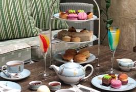 Art of London Afternoon Tea spread out on a table in the Orangery at Ham Yard Hotel