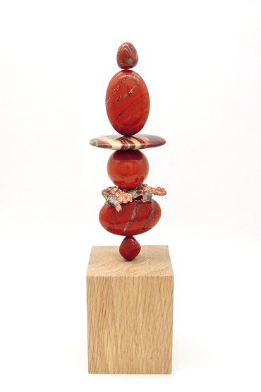 TOTEM 39 is entirely unique made from the following precious crystal stones:
From the top – 2 x Red Jasper, Red stripe Jasper, Red Jasper sphere, Raw Copper, Red Jasper x 2. The stones are supported on a central support sitting on an oak base.