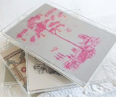 Stack of trays with the Pear Tree Tray on the top