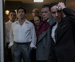 A scene from The Many Saints of Newark showing Ray Liotta, Alessandro Nivola, Corey Stoll, Jon Bernthal, John Magaro, and Billy Magnussen. - link to The Many Saints of Newark