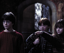 A picture of Daniel Radcliffe, Rupert Grint, Emma Watson staring in Harry Potter and the Philosopher's Stone. - link to Harry Potter and the Philosopher's Stone