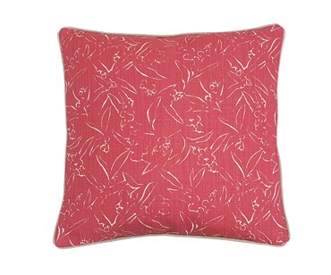 Cushion with Christopher Farr Inside Out fabric in pink with contrast natural piping