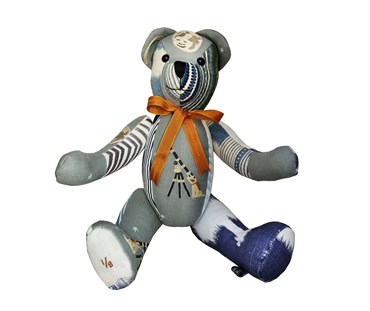 Large patchwork toy in Moondog blue fabric and other matching in grey and blue colourways