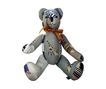 Large patchwork toy in Moondog blue fabric and other matching in grey and blue colourways