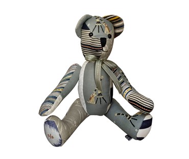Large patchwork toy in Moondog blue fabric and other matching in grey and blue colourways