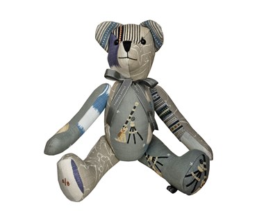 Large patchwork toy in Moondog blue fabric and other matching in grey and blue colourways