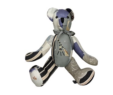 Large patchwork toy in Moondog blue fabric and other matching in grey and blue colourways
