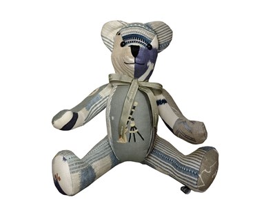 Large patchwork toy in Moondog blue fabric and other matching in grey and blue colourways