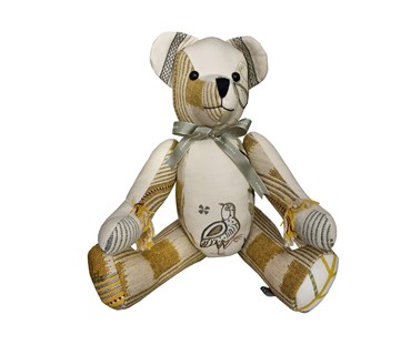 Patchwork large bear with Wee Beasties fabric and various other matching in yellow and cream colourways