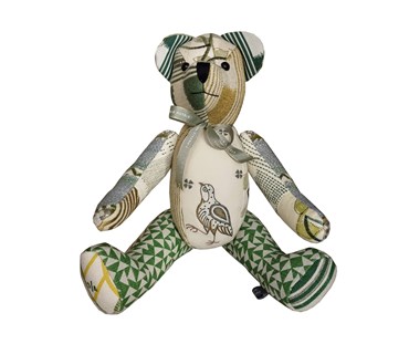 Patchwork large bear with Wee Beasties fabric and various other matching in yellow, cream and green colourways