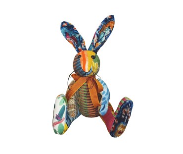 Colourful Minnie Rabbit patchwork toy featuring various fabrics from Clarence House
