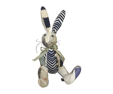 Over the Moon patchwork toy in various fabrics in shades of grey and navy