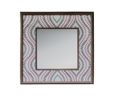 Fabric mirror in Villefranche fabric featuring mix of florals and geometrics with complementing stripes and textures, the seven designs in five colour groups combine embroidery and print.