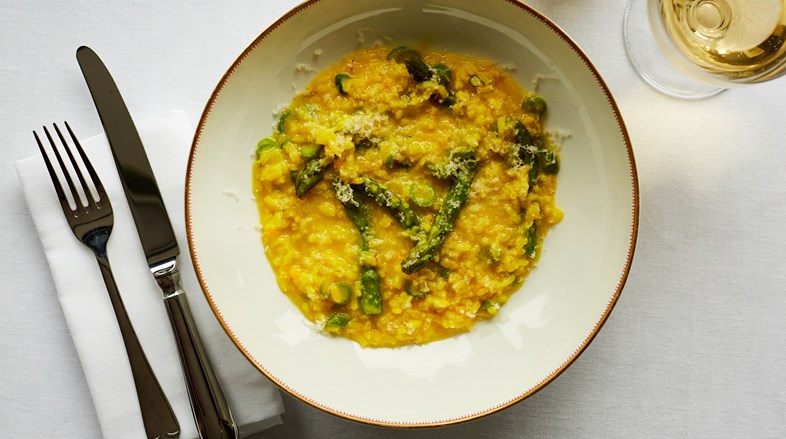 Saffron risotto with steamed asparagus and ricotta. Roast skate wing, slow cooked broad beans, chorizo and parsley
