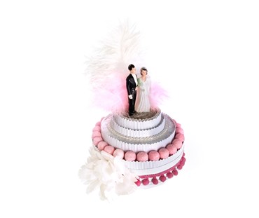 Papier-Mache and cardboard Royal Ascot hat featuring cake with bride and groom topper