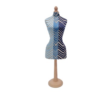 Front facing mini mannequin in the navy bookend fabric