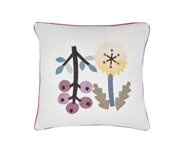 Makoto cushions in plain linen fabric with a flower design