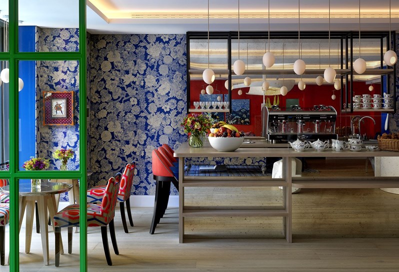 A view of the lobby reception area at 9-11 Richmond Buildings featuring a coffee bar and occassional seating.