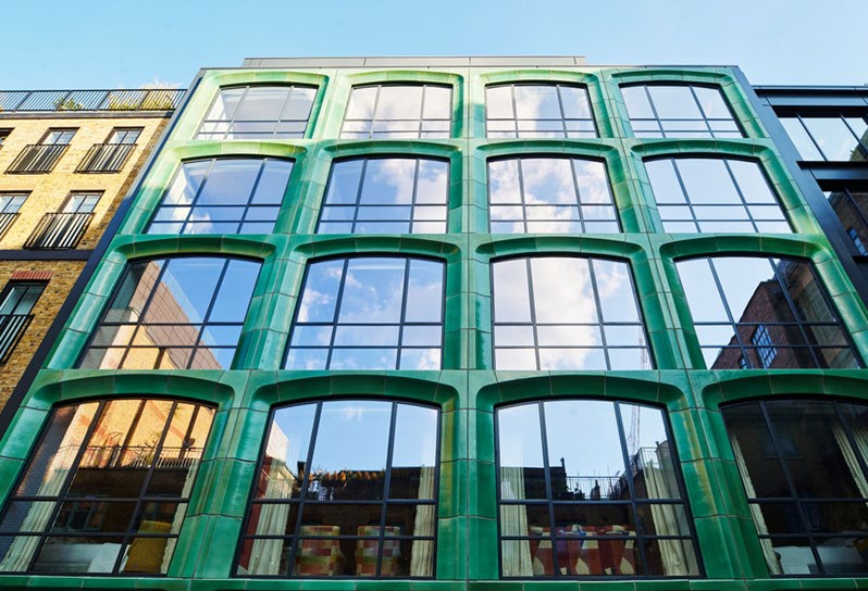 The striking ceramic green facade of 9 - 11 Richmond Buildings in Soho London