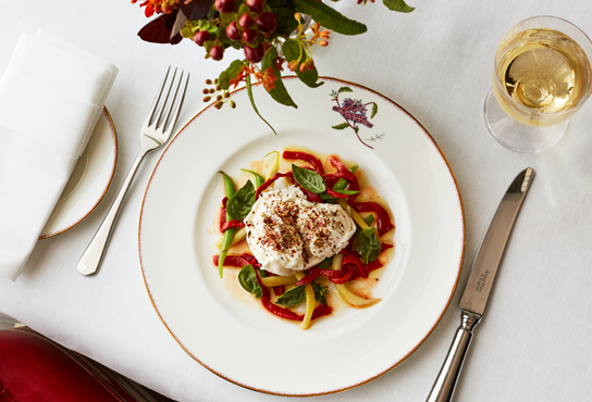 A summer bean salad with mozzarella, marinated peppers and basil