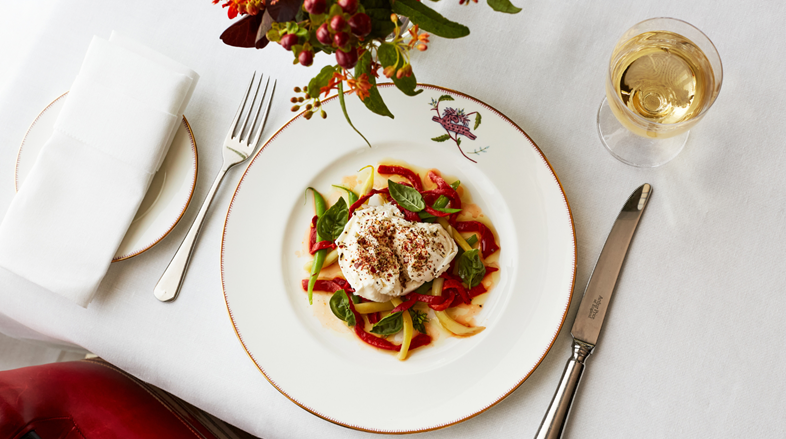 A summer bean salad with mozzarella, marinated peppers and basil