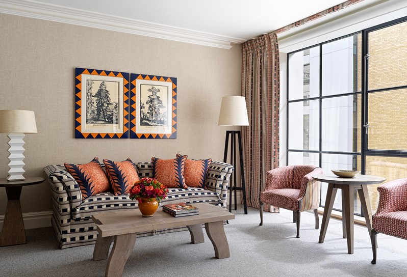 A seating area of a Luxury Junior Suite at Ham Yard Hotel